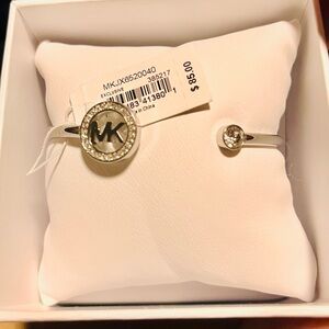 Michael Kors Silver Logo Bracelet with Crystal. Look at the matching earrings.